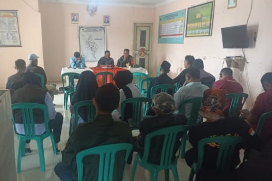 SERTU FADLAN NURHADI MENGIKUTI KEGIATAN MUSYAWARAH DESA DI KANTOR DESA SIMPANG