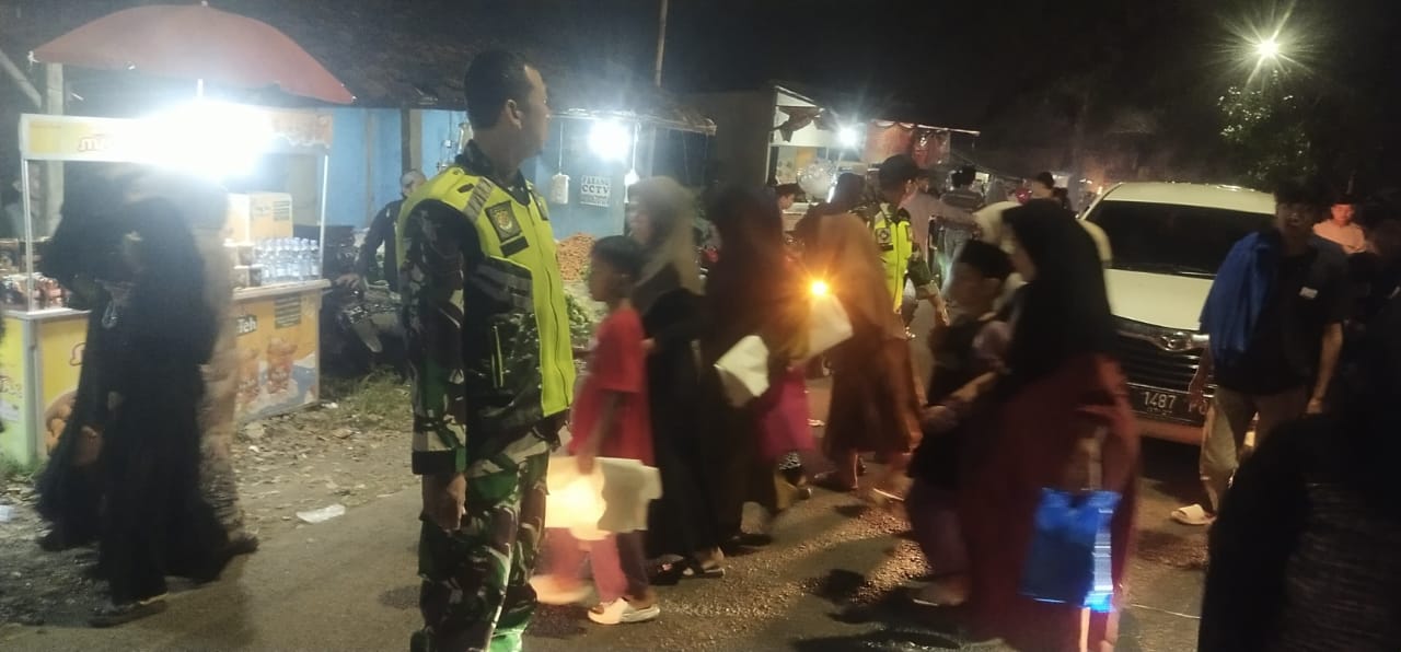 ANGGOTA KORAMIL 0608-08/MANDE LAKSANAKAN PENGAMANAN PAWAI OBOR, SANTUNAN ANAK YATIM, DAN TABLIGH AKBAR