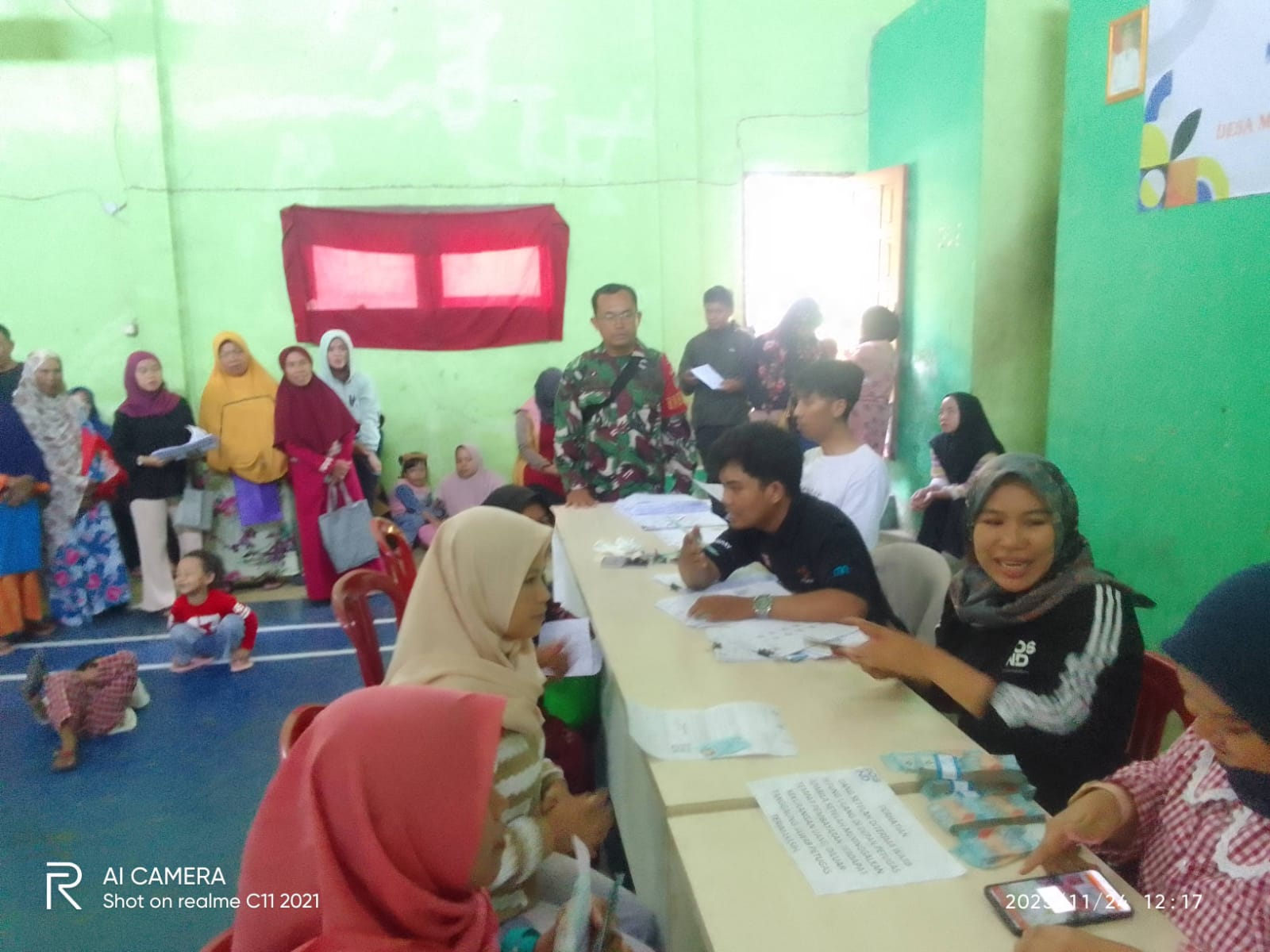 Tepat Sasaran: Babinsa Munjul Awasi Penyaluran BLTS Kesra Melalui Kantor Pos