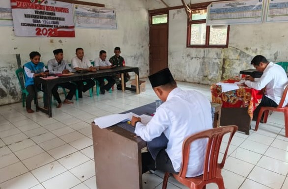 Sinergi Membangun Desa: Kopka Didit Rino Hadiri Rapat Penting di Aula Desa Neglasari